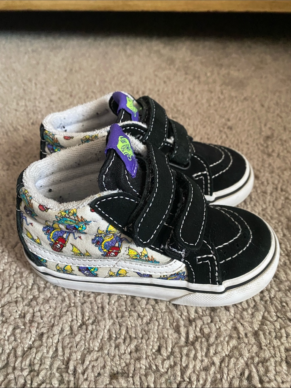 Vans OldskoolKids Black and White High-Top Sneakers with Colorful Cartoon Accent